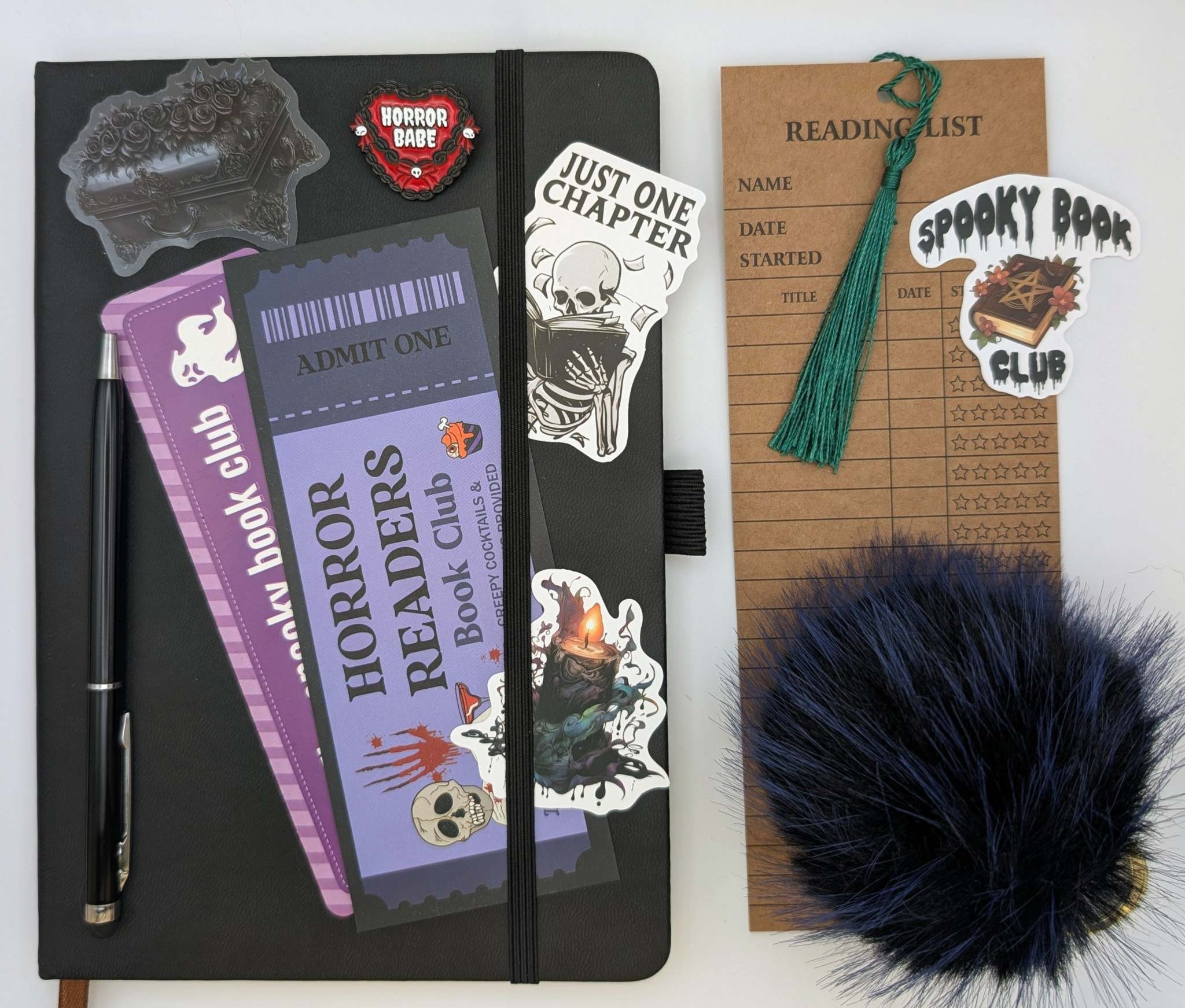 Horror book nerd bundle with notebook, bookmarks, keychain, ballpoint pen, stickers, and pin