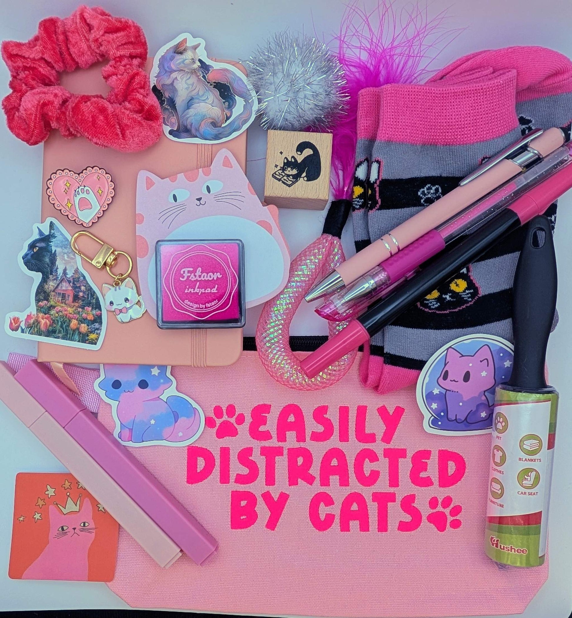 Cat nerd deluxe bundle with notebook, highlighters, ballpoint pen, gel pen, marker, stickers, keychain, scrunchie, cat toys, pin, sticky notepad, zippered pouch, pin, socks, ink pad, cat stamp
