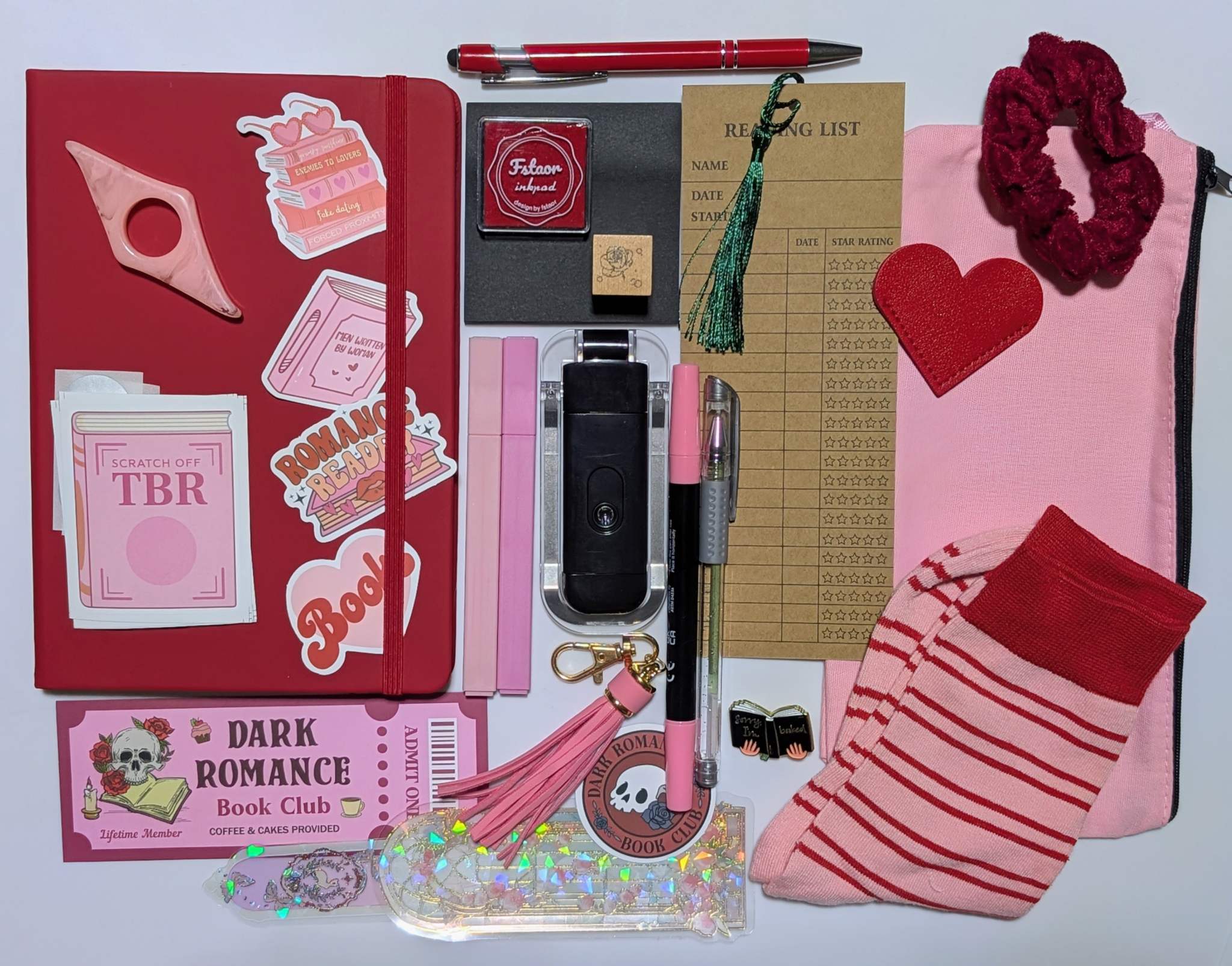 Book nerd deluxe bundle with journal, book light, socks, stamp, ink pad, TBR scratchers, stickers, keychain, bookmarks, zippered pouch, highlighters, gel pen, ballpoint pen, marker, page holder, sticky notepad, pin, scrunchie