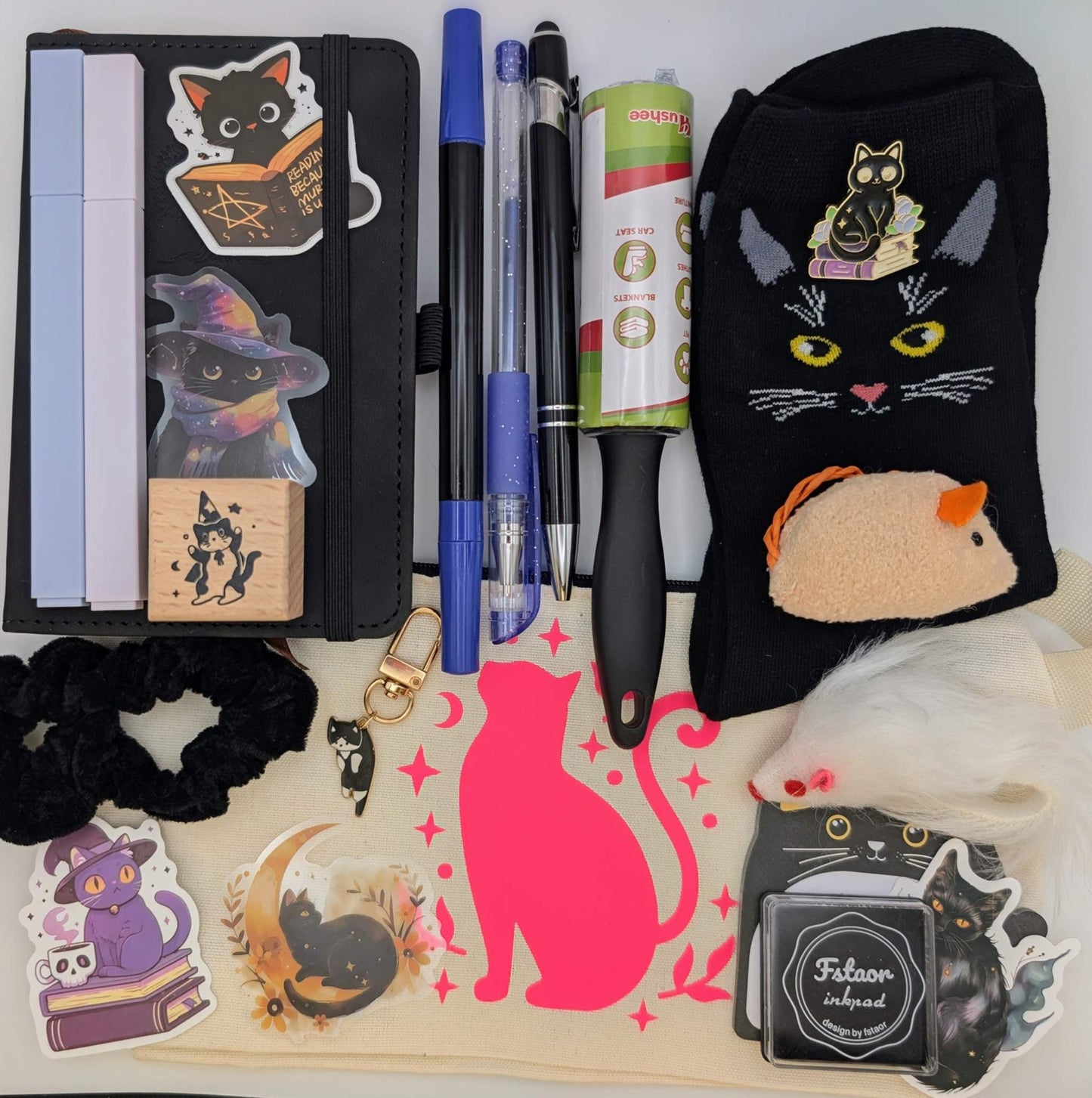 Cat nerd deluxe bundle with notebook, highlighters, ballpoint pen, gel pen, marker, stickers, keychain, scrunchie, cat toys, pin, sticky notepad, zippered pouch, pin, socks, ink pad, cat stamp